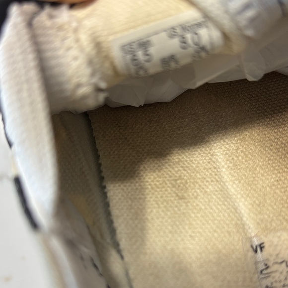 Vans Women's Checkered Slip-On Sneakers - Black, White, and Brown - Picture 15 of 15